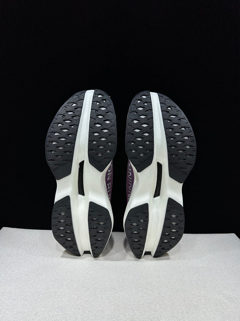 On Cloudboom Max Running Sneakers in White Purple - product image from the listing.