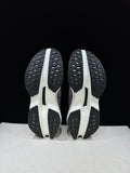On Cloudboom Max Running Sneakers in White Purple - product image from the listing.