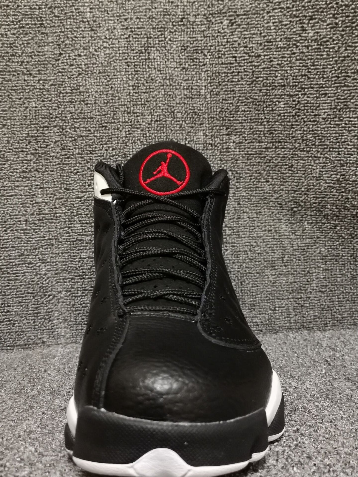 Air Jordan 13 Retro Black Red White Sneakers - product image from the listing.