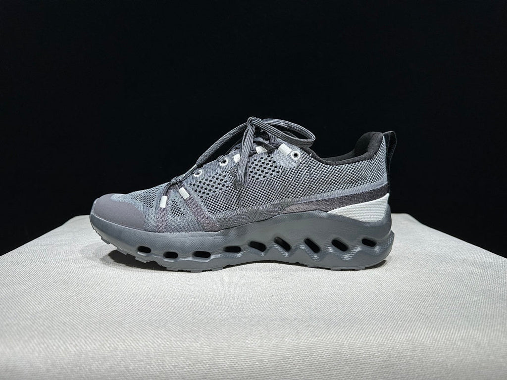 On Cloudsurfer Trail Sneakers, in Dark Gray - product image from the listing.