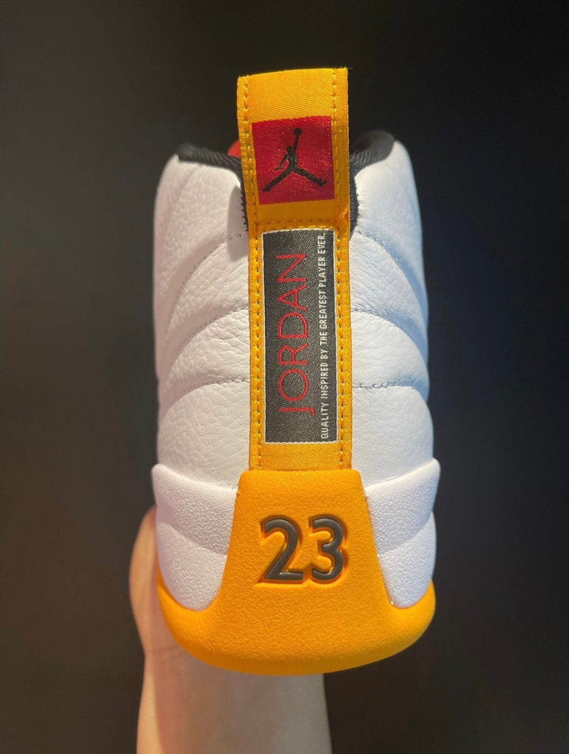 Air Jordan 12 25 Years in China White Black Yellow DR8887-100 - product image from the listing.