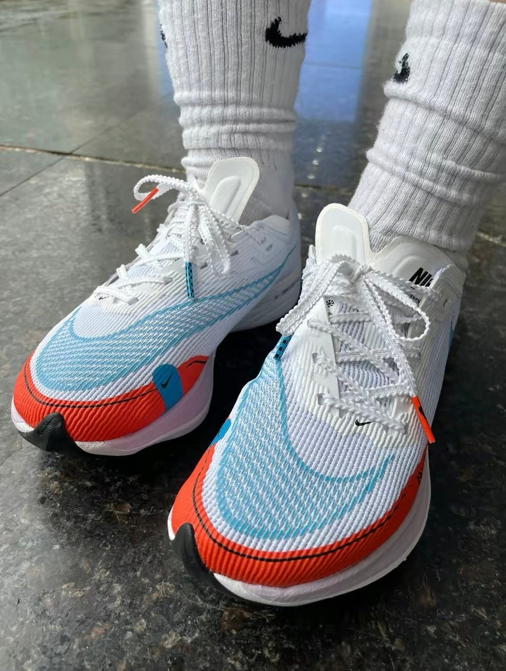 Nike ZoomX Vaporfly NEXT% 2 Running Shoes in White Blue Red CU4123-102 - product image from the listing.