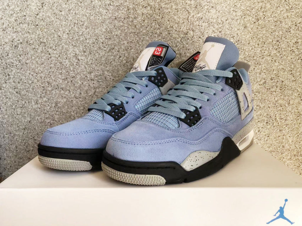 Jordan 4 Retro Sneakers in University Blue - product image from the listing.