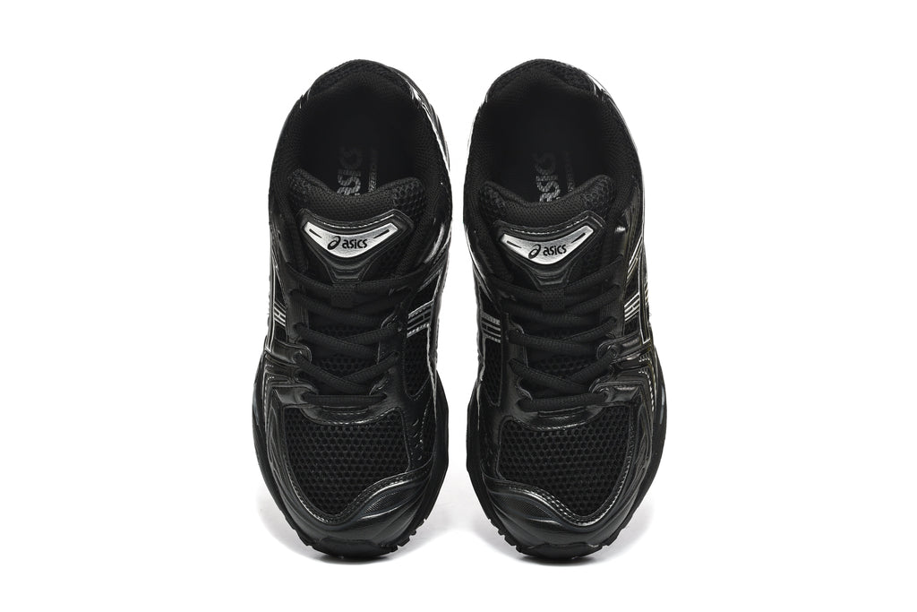 ASICS Gel-Kayano 14 Sneakers in Black and Silver - product image from the listing.