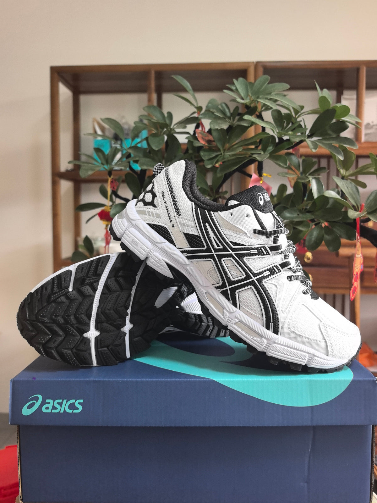 ASICS K3 Sneakers in Black and White - product image from the listing.