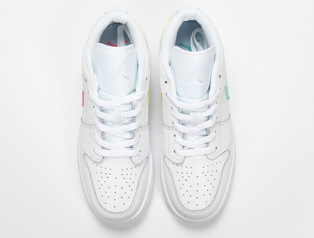 Nike Air Force 1 Low Candy Swoosh Sneakers in White CW7035-100 - product image from the listing.