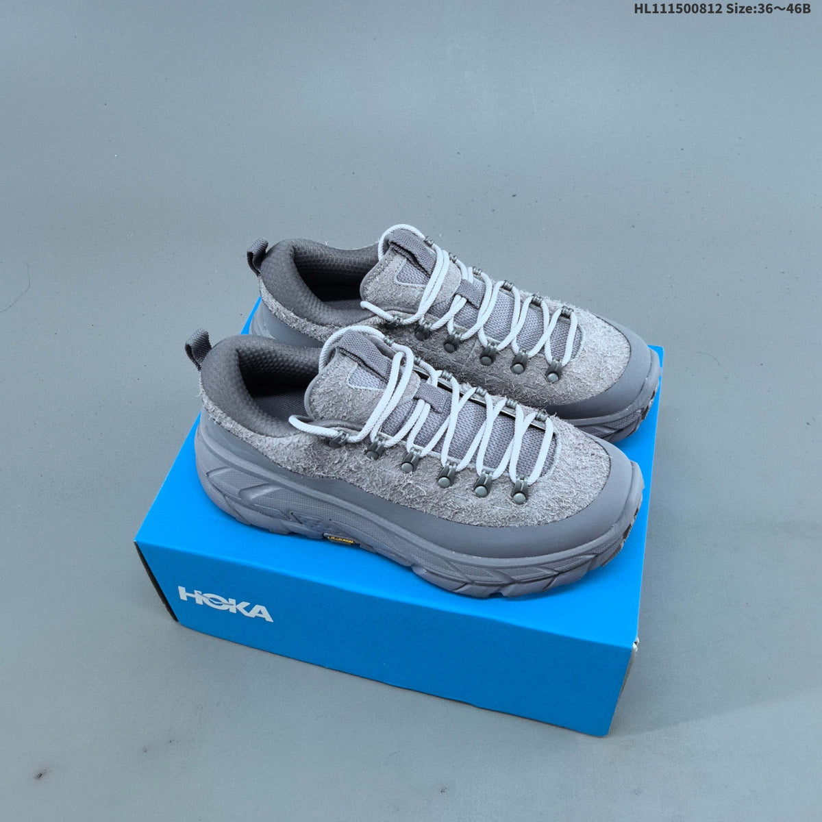 HOKA Tor Low-Top Sneakers in Summit - product image from the listing.