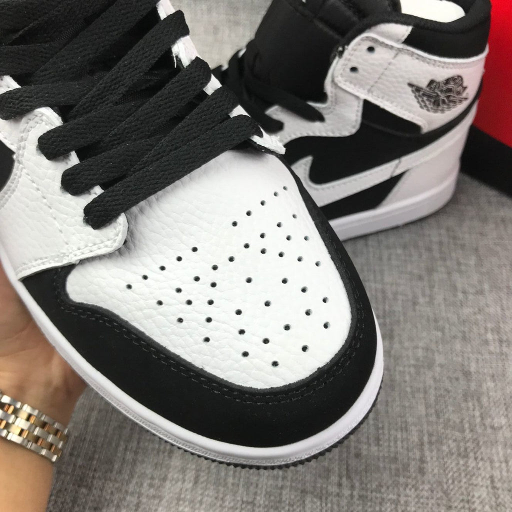 Air Jordan 1 High Sneakers in Black and White 554724-113 - product image from the listing.
