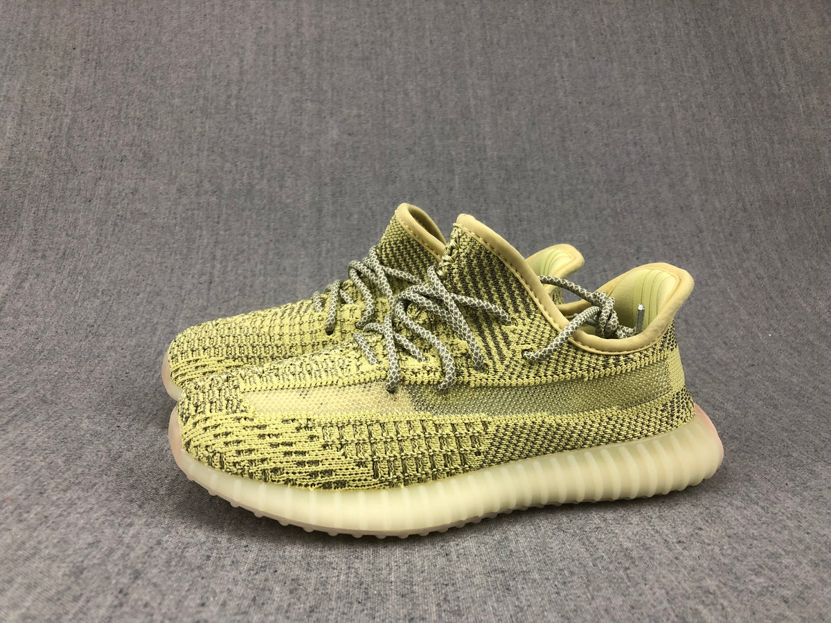 Yellow and Olive Yeezy 350 V2 Kids Sneakers - product image from the listing.