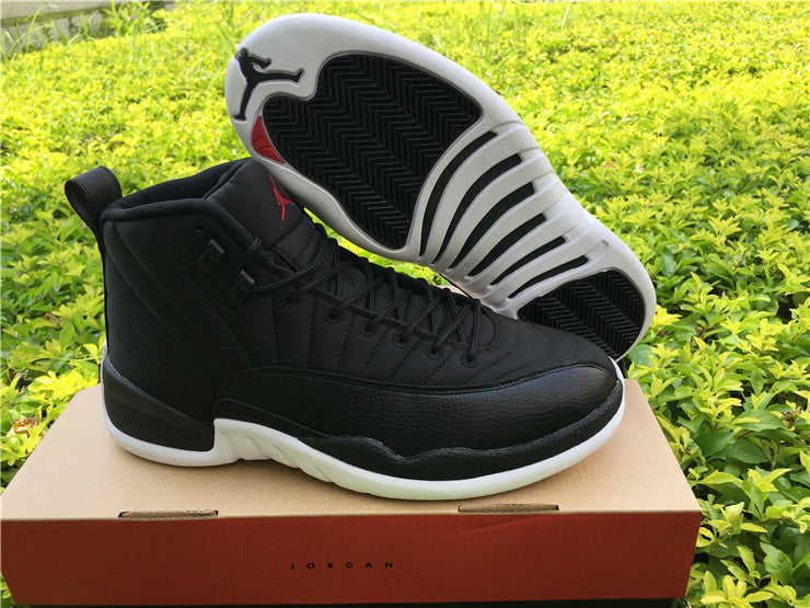 Air Jordan 12 Black Nylon High-Top Sneakers - product image from the listing.