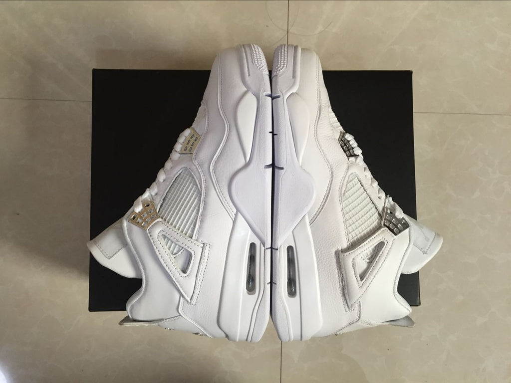 Air Jordan 4 Retro White High-Top Sneakers - product image from the listing.