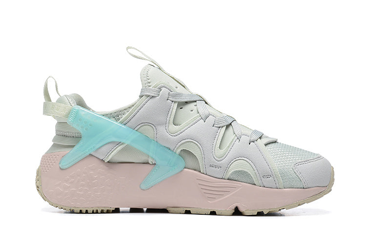 Nike Air Huarache Sneakers in Light Grey Pink Aqua - product image from the listing.
