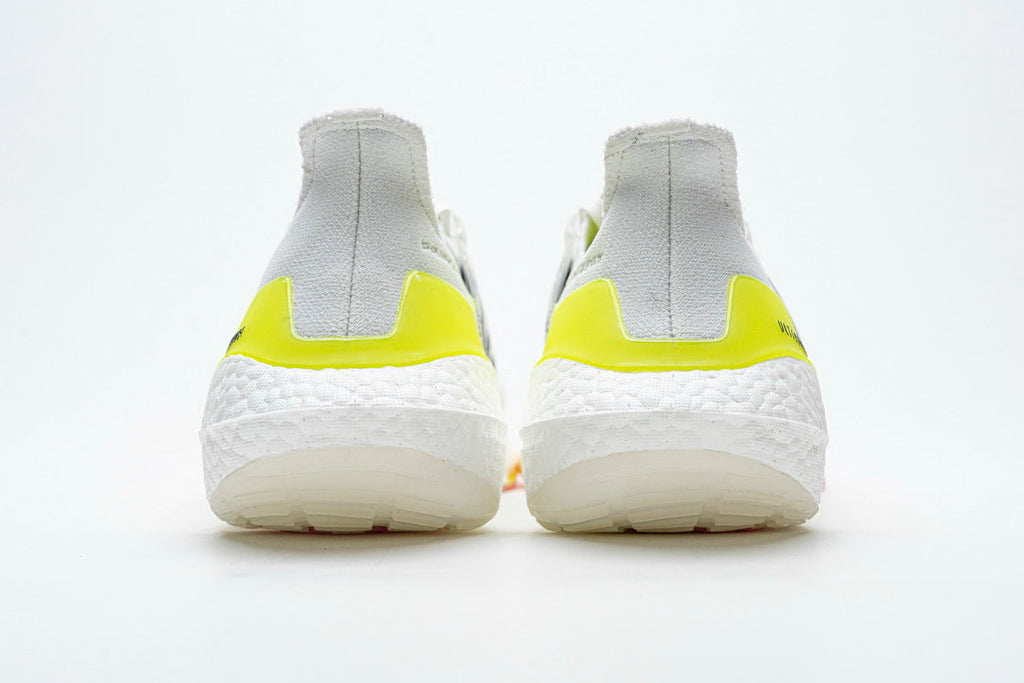 Adidas Ultraboost 21 Running Shoes FY0377 in White Yellow - product image from the listing.