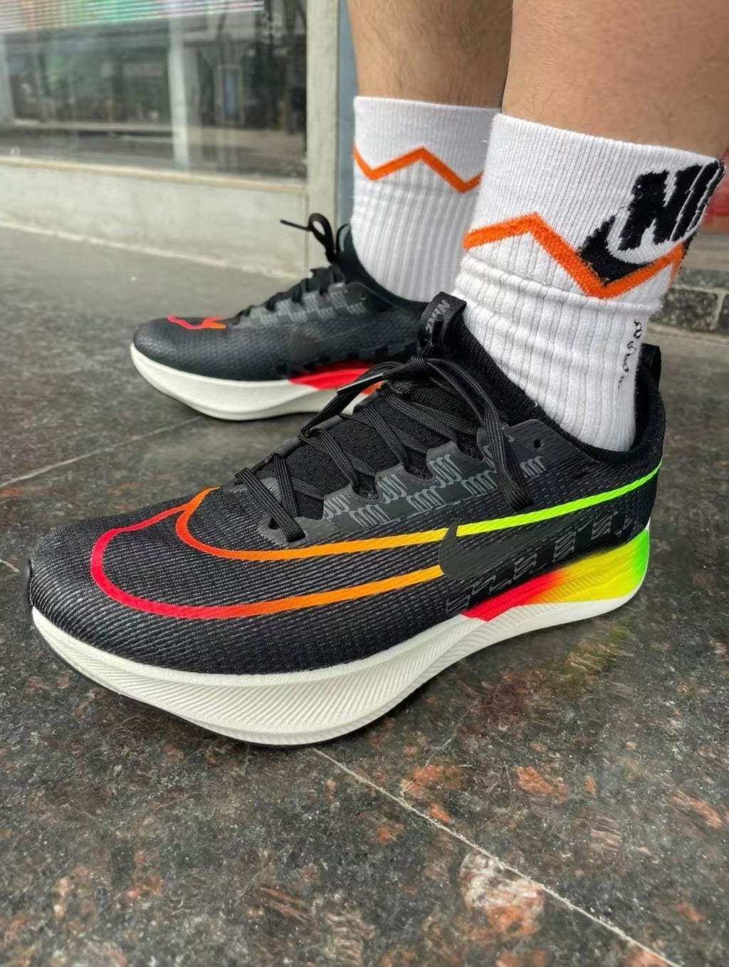 Nike Zoom Fly 4 Running Shoes in Black Orange Green DQ4993-010 - product image from the listing.
