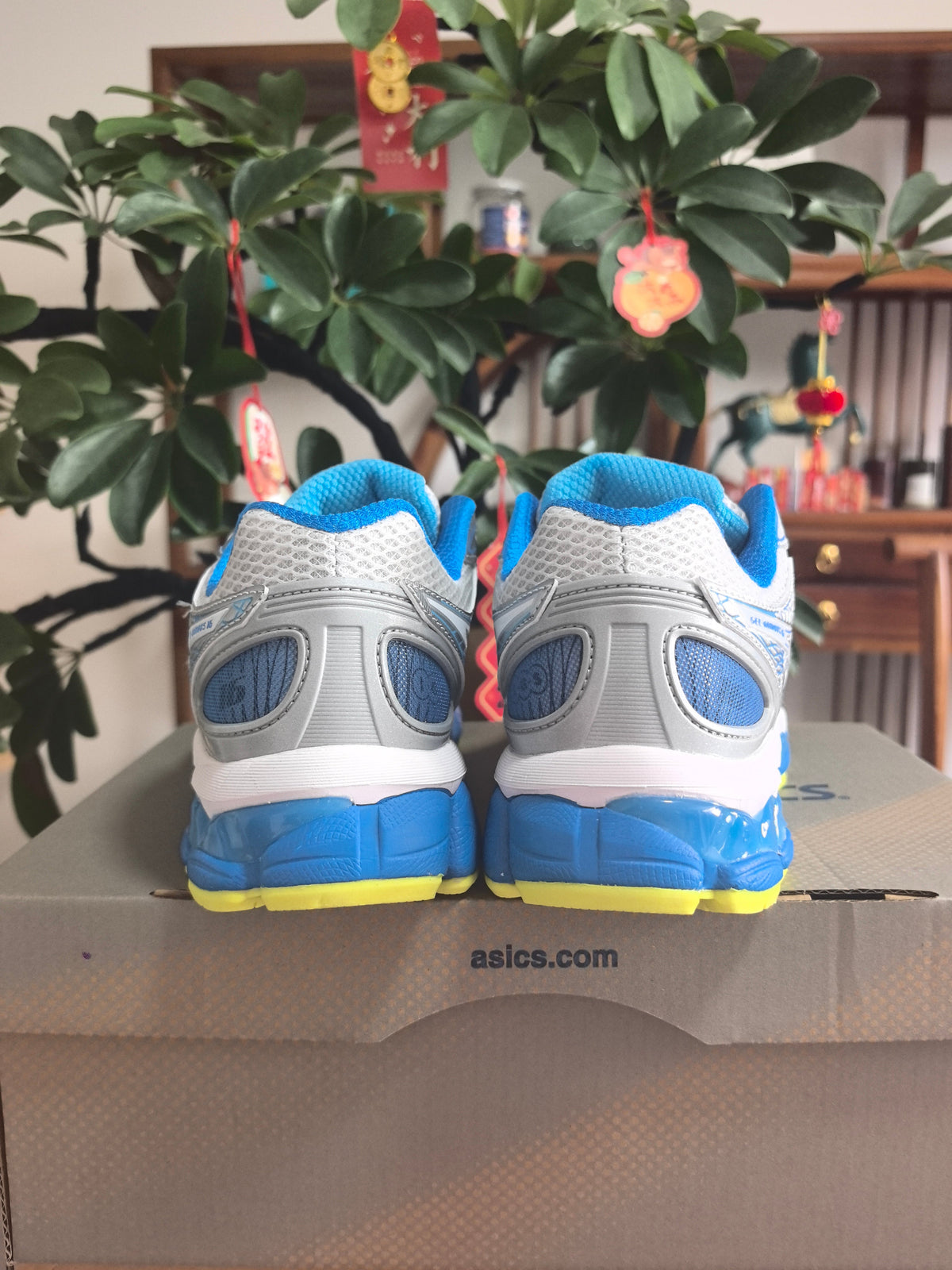 ASICS GEL-KINSEI 16 Running Shoes in White Blue - product image from the listing.