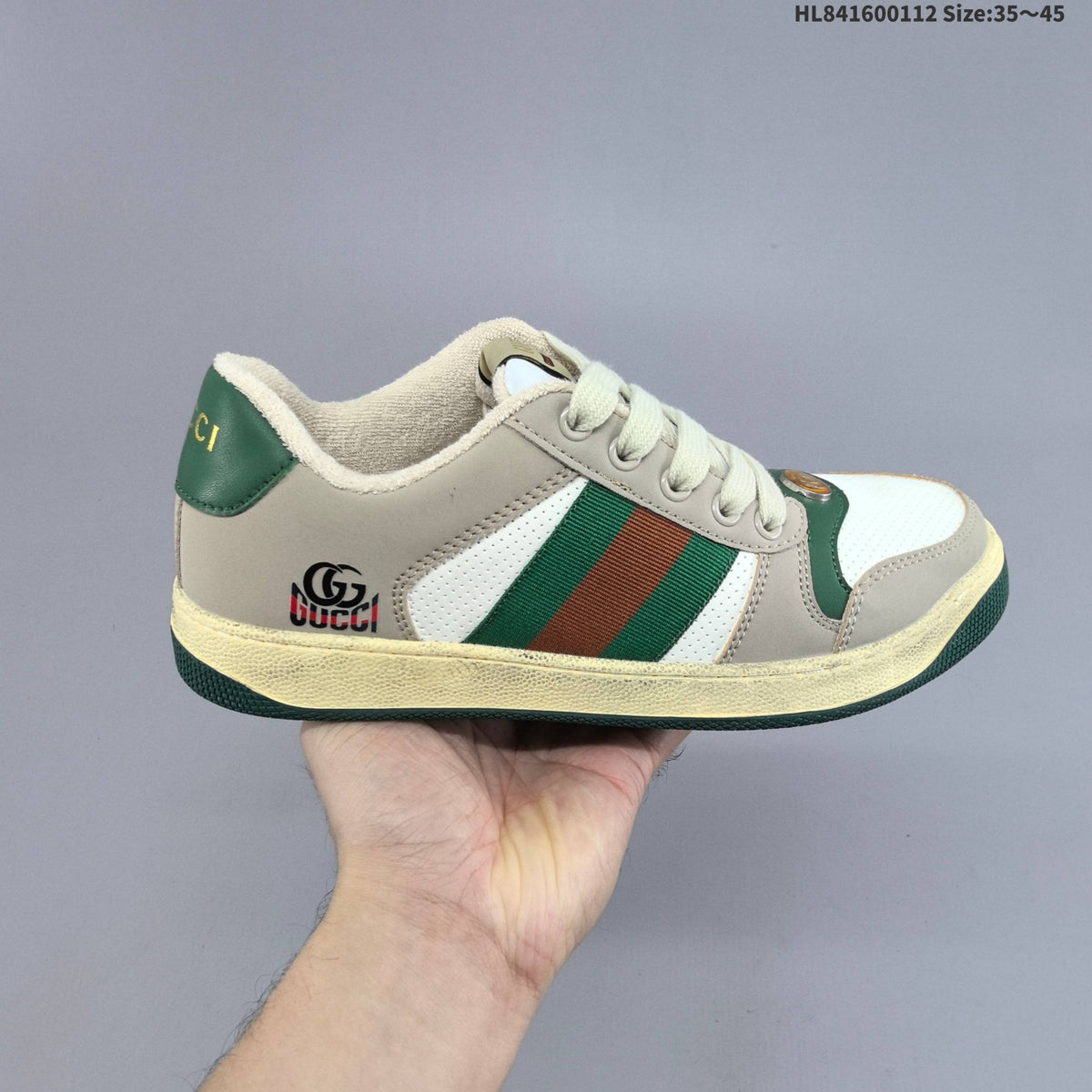 Gucci Screener Distressed Low-Cut Sneakers - product image from the listing.
