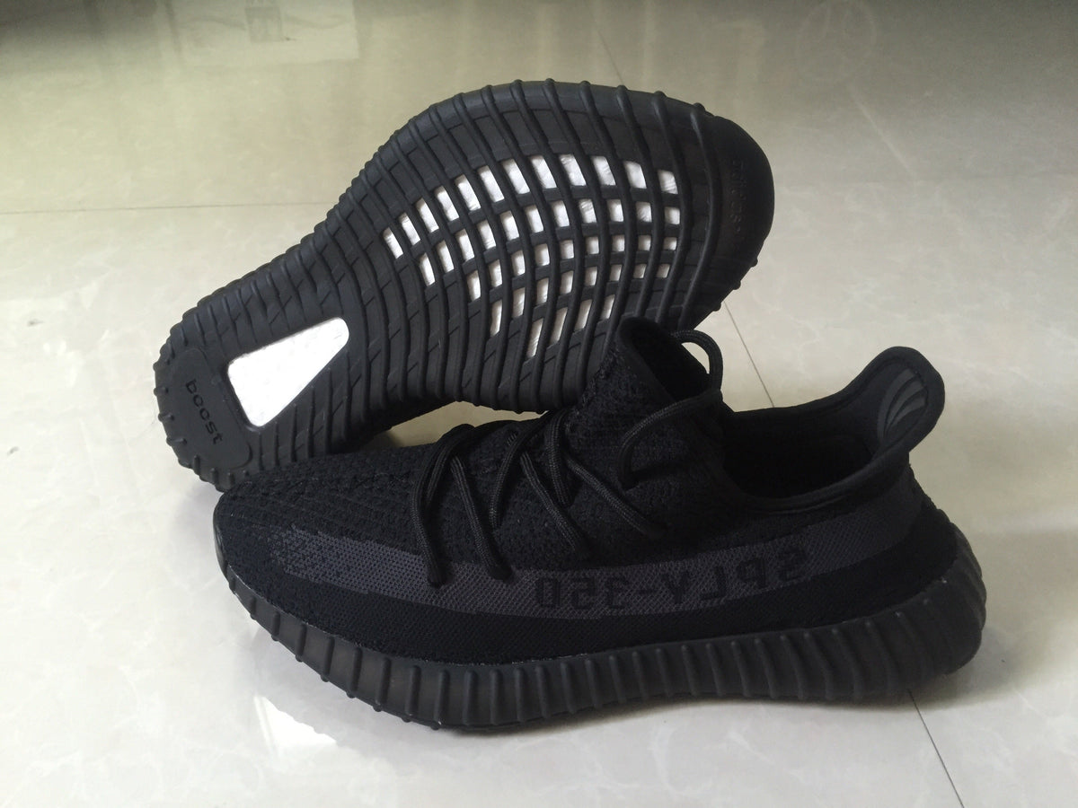 Adidas Yeezy Boost 350 V2 Sneakers in Black Knit - product image from the listing.