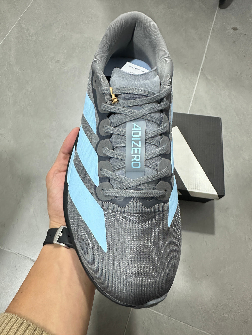 Grey and Blue Adizero Lightstrike Pro Running Shoes - product image from the listing.