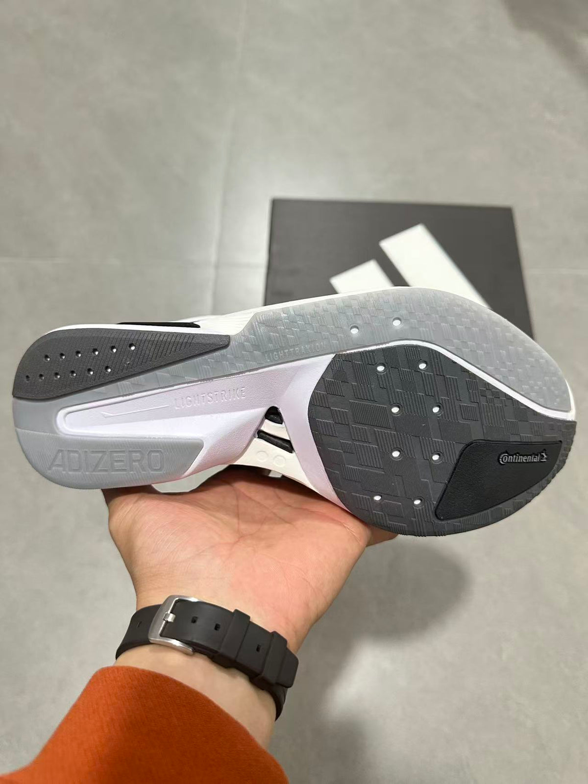 adidas Adizero Lightstrike Pro Running Shoes in White Black JS4939 - product image from the listing.