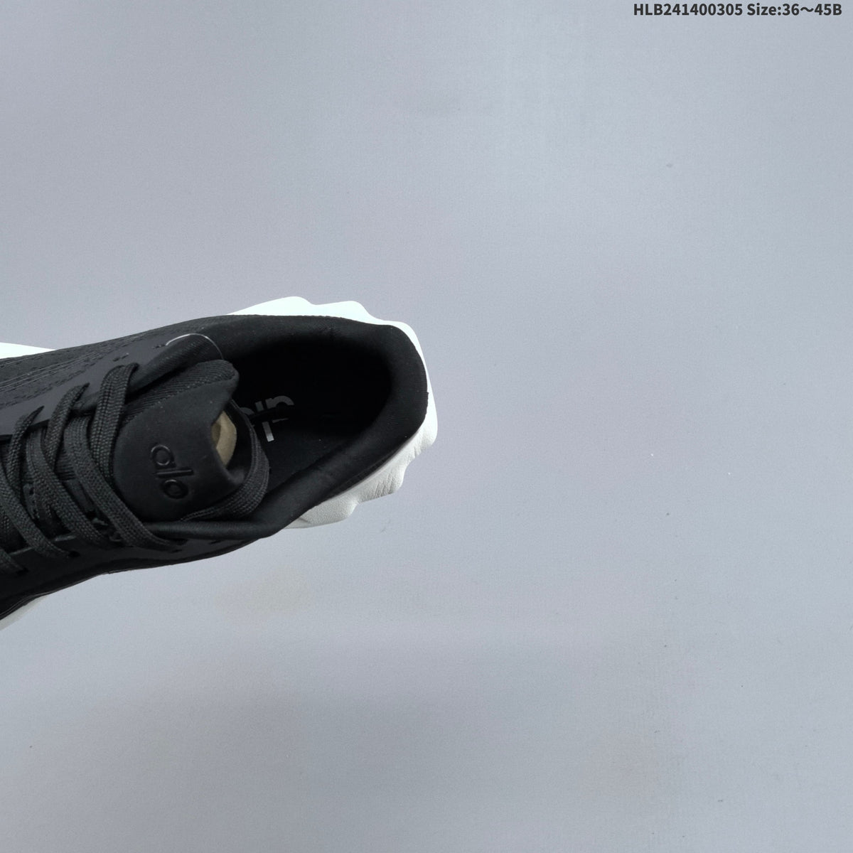 Alo Recovery Mode Running Shoes, in Black and White - product image from the listing.