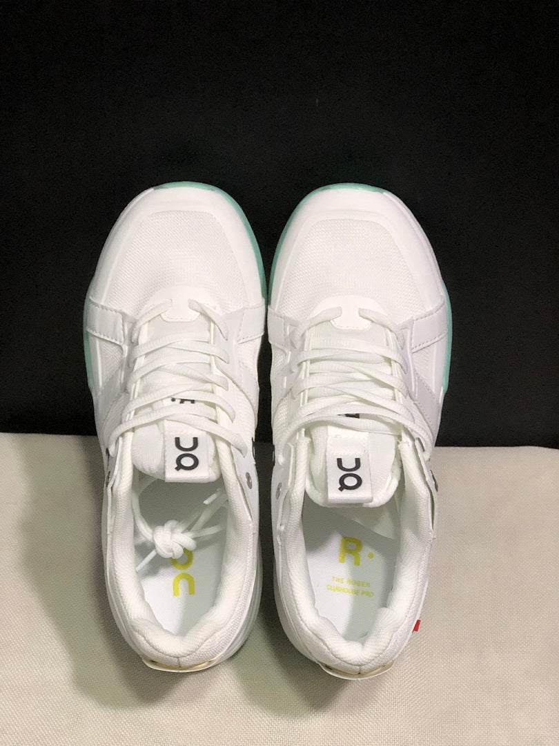 On THE ROGER Clubhouse Pro Tennis Shoes in White Mint Green - product image from the listing.