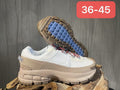 White and Tan Nike F7 Gen 2 Sneakers - product image from the listing.
