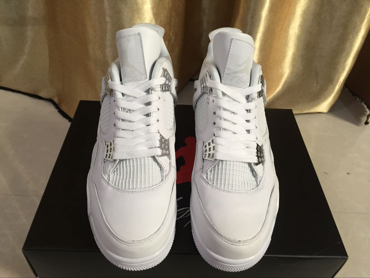 Air Jordan 4 Retro White High-Top Sneakers - product image from the listing.