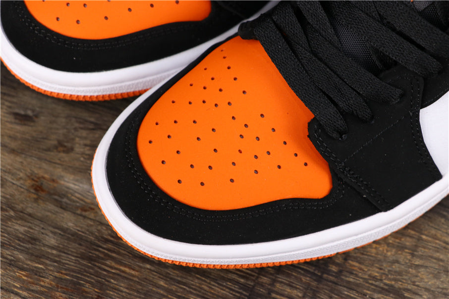 Air Jordan 1 Low Black White Orange Sneakers 553558-128 - product image from the listing.