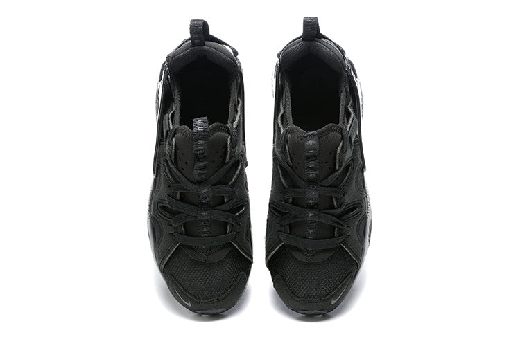 Nike Air Huarache Sneakers in Black - product image from the listing.