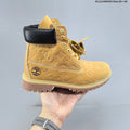 Timberland 6-Inch Style High-Cut Boots, Wheat Monogram - product image from the listing.