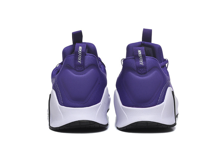 Nike Free Low-Top Sneakers in Purple - product image from the listing.