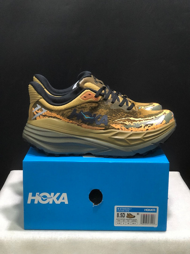 HOKA Stinson 7 Trail Shoes for Running in Camo - product image from the listing.