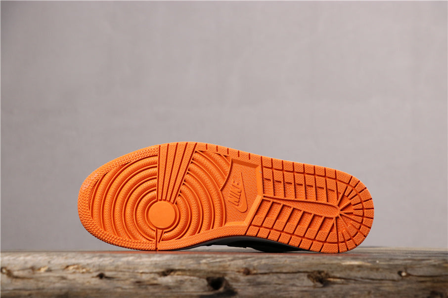 Air Jordan 1 Low Black White Orange Sneakers 553558-128 - product image from the listing.