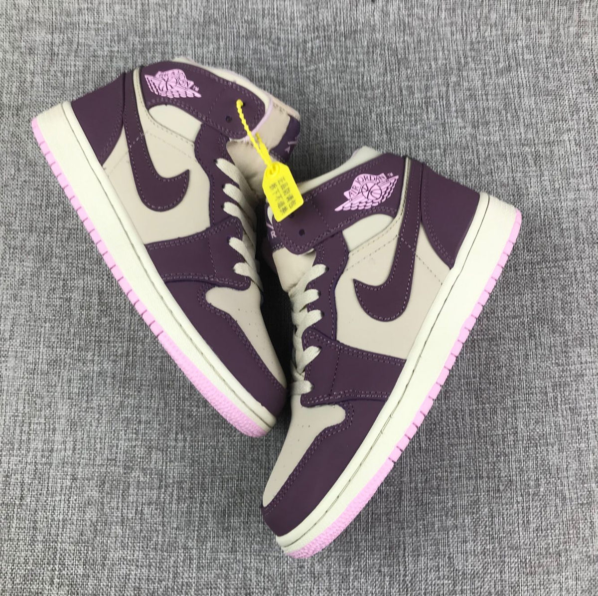 Air Jordan 1 Retro High OG Sneakers in White Purple - product image from the listing.
