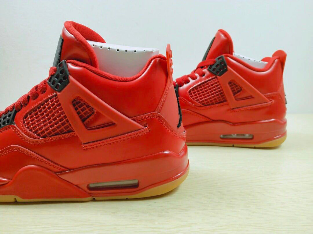 Air Jordan 4 Singles Day Sneakers in Red AV3914-600 - product image from the listing.
