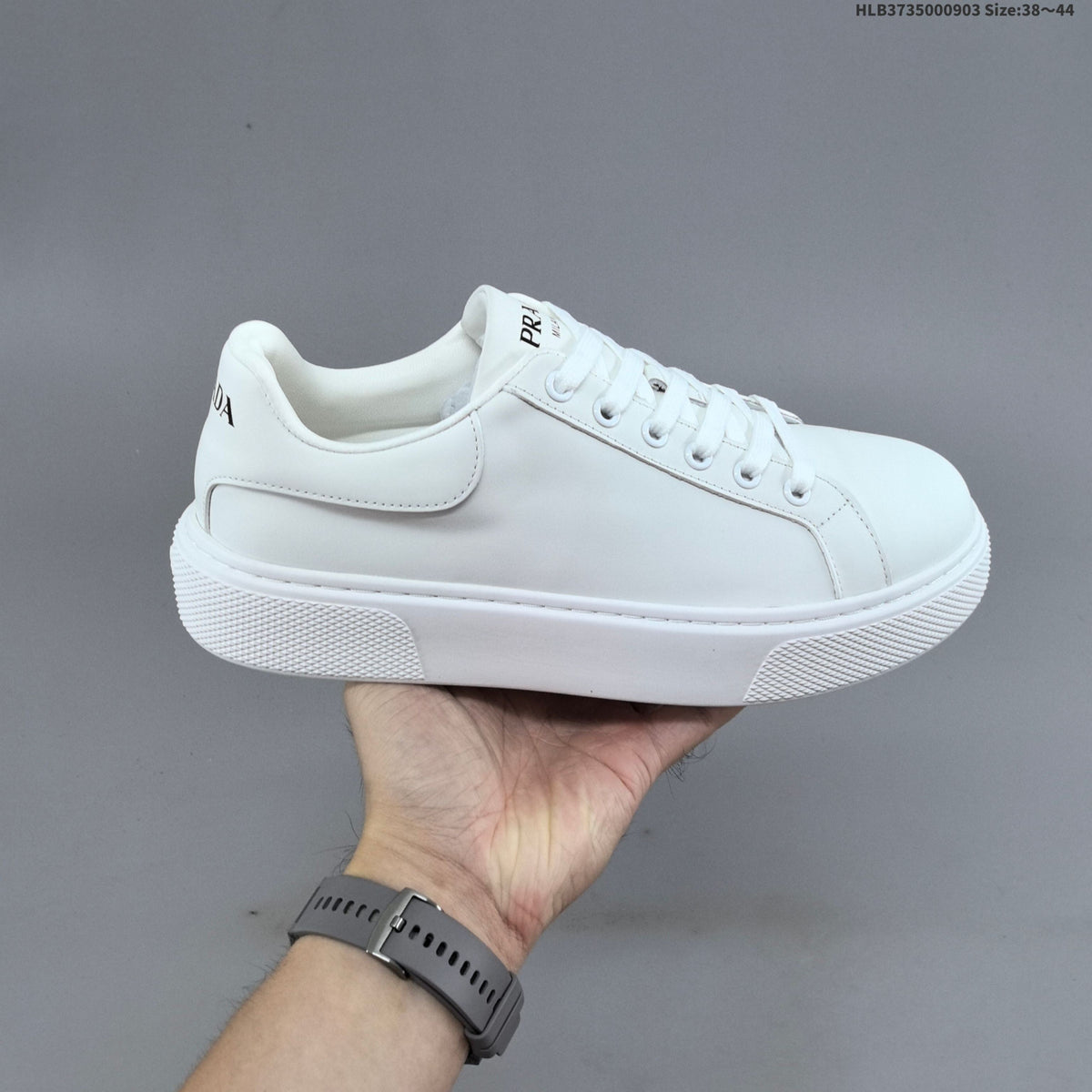 Prada Cloudbust Thunder Low-Top Sneakers, in White and Black - product image from the listing.