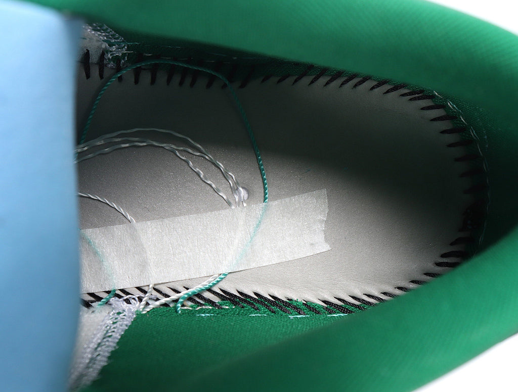 Air Jordan 1 Low White and Green Sneakers 553558-301 - product image from the listing.