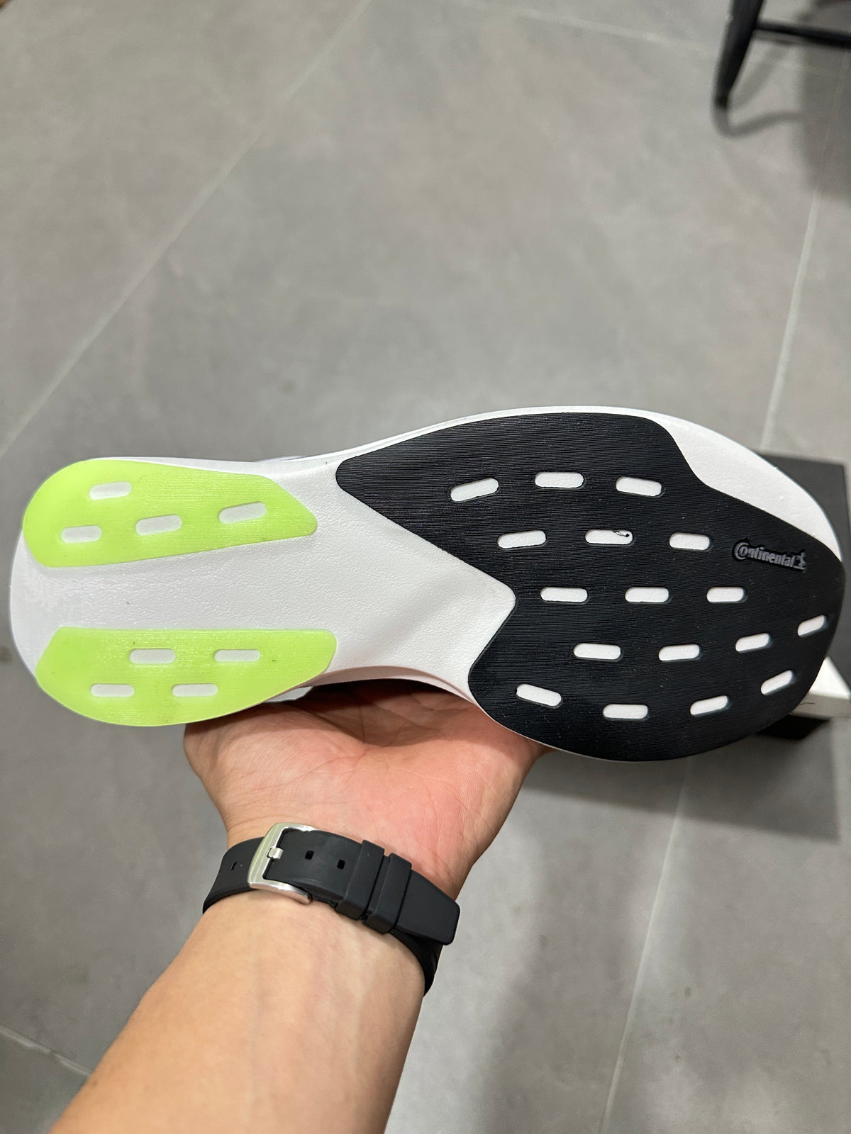 Adizero Lightstrike Pro Running Shoes in White Purple Green - product image from the listing.