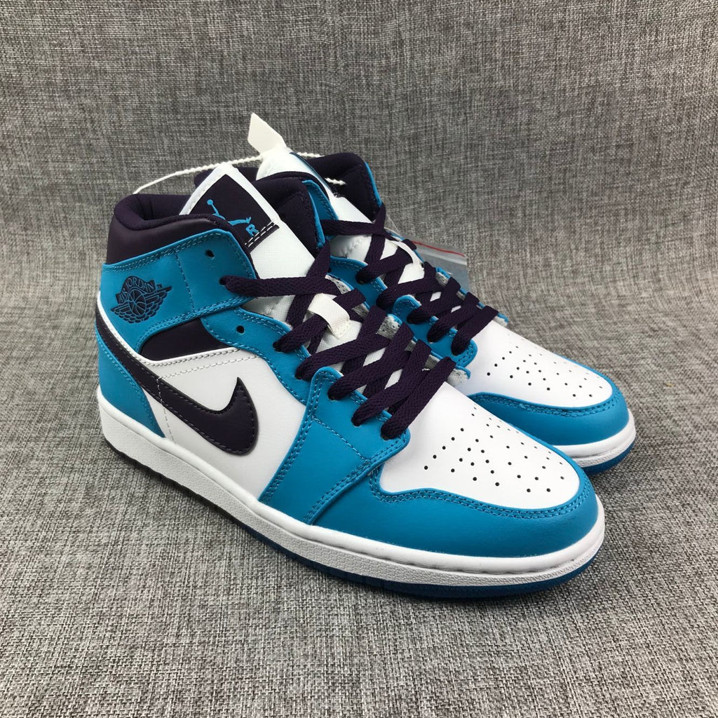 Air Jordan 1 Mid Sneakers in Blue, in White and Black - product image from the listing.