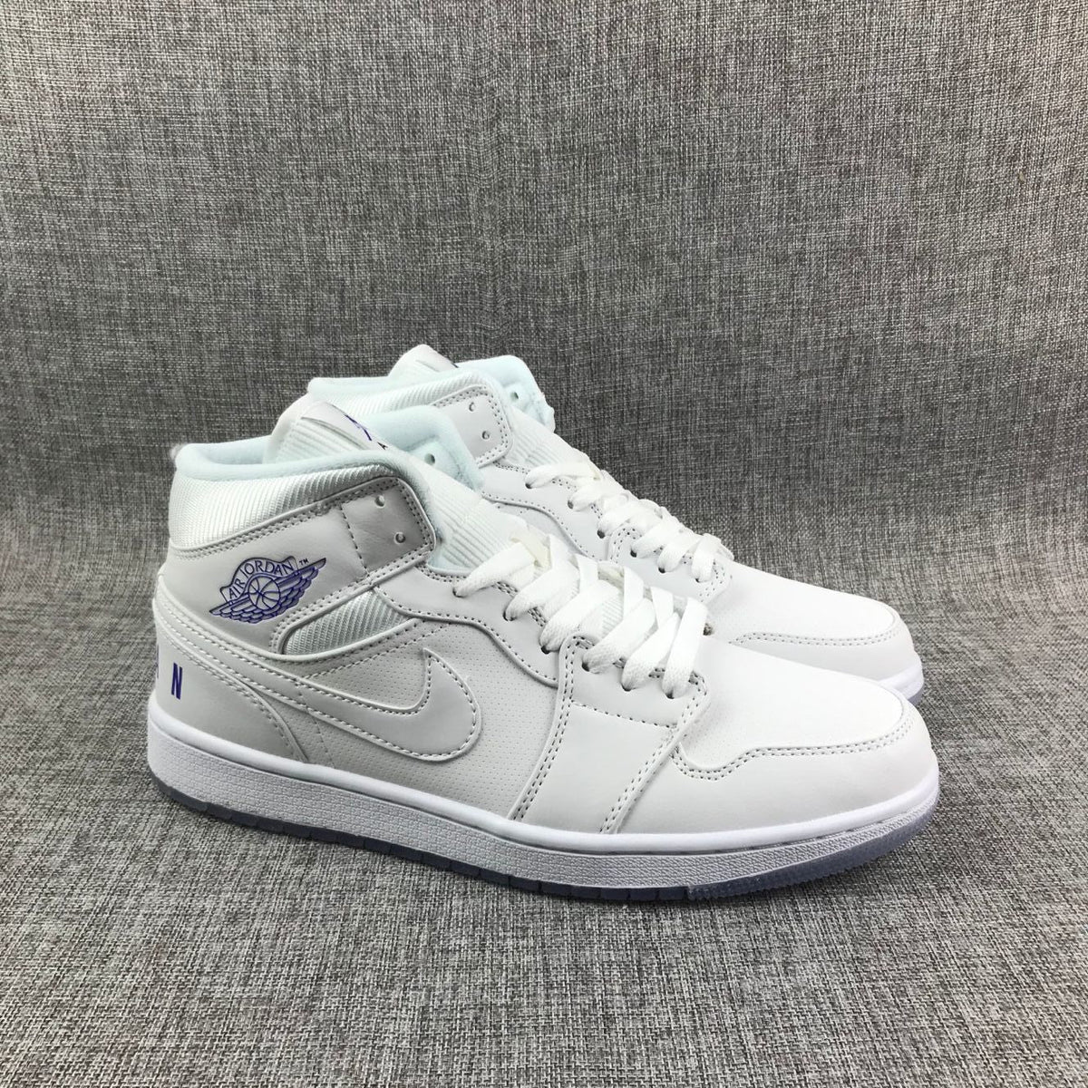 White Sneakers with Translucent Outsole - Air Jordan 1 Mid - product image from the listing.