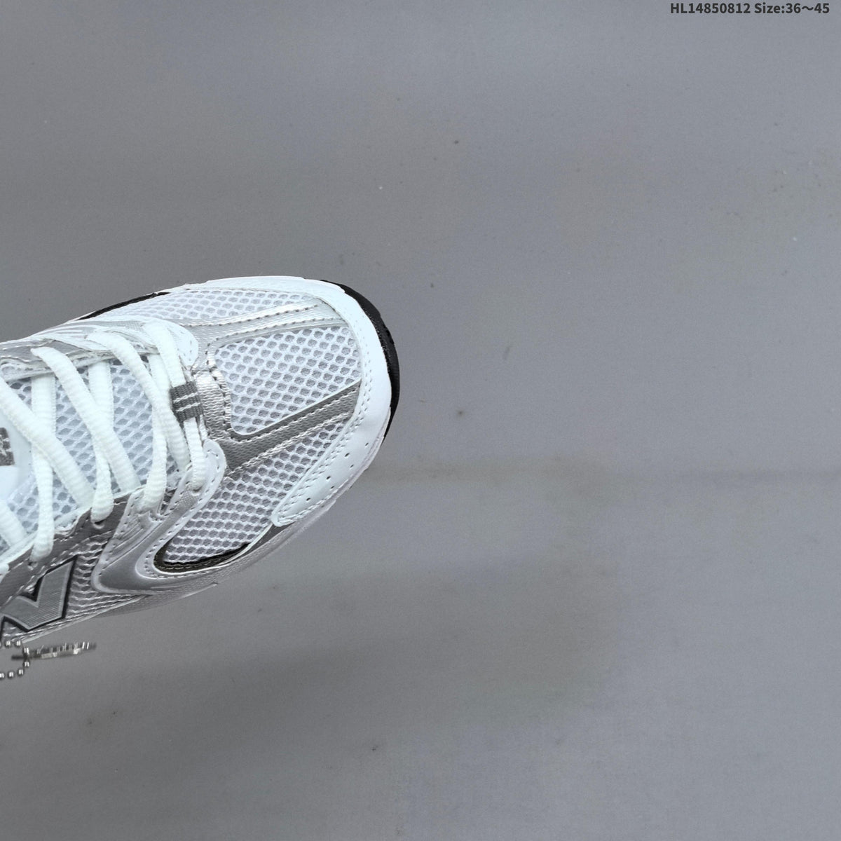 New Balance MR530AD Retro Mesh Sneakers in White Silver - product image from the listing.