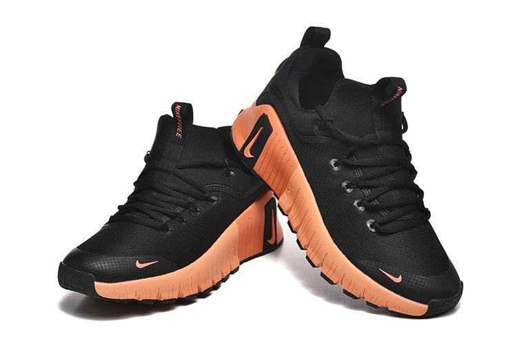 Nike Free TR Fitness Sneakers in Black and Coral - product image from the listing.