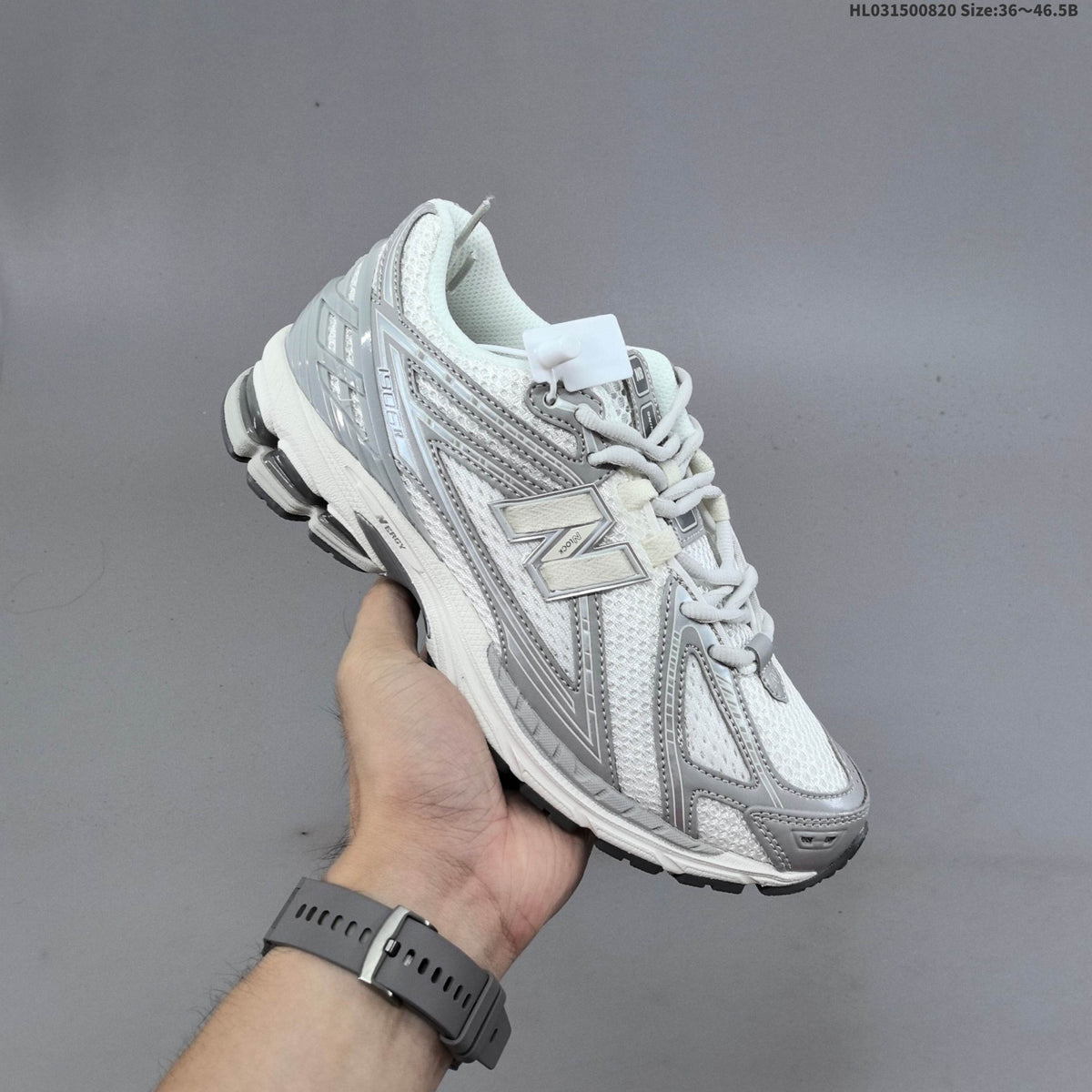 New Balance 1906R Sneakers in White Silver U1906RJM - product image from the listing.