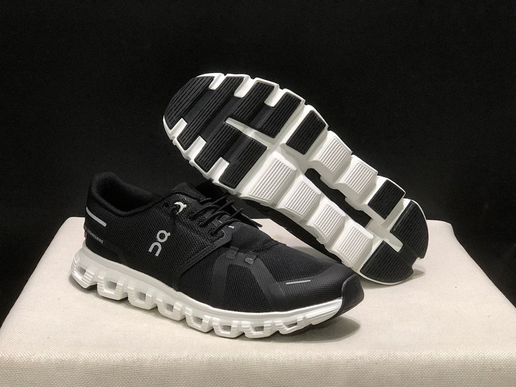 On Cloud 6 Running Sneakers in Black White - product image from the listing.