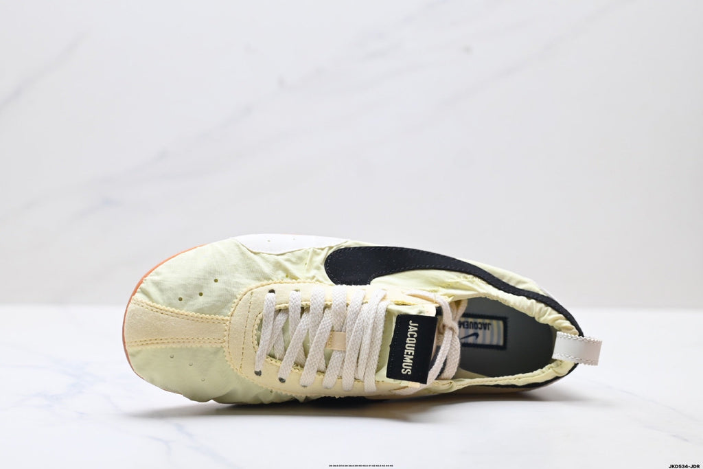 Pale Yellow and Black Nike x Jacquemus Sneakers - product image from the listing.