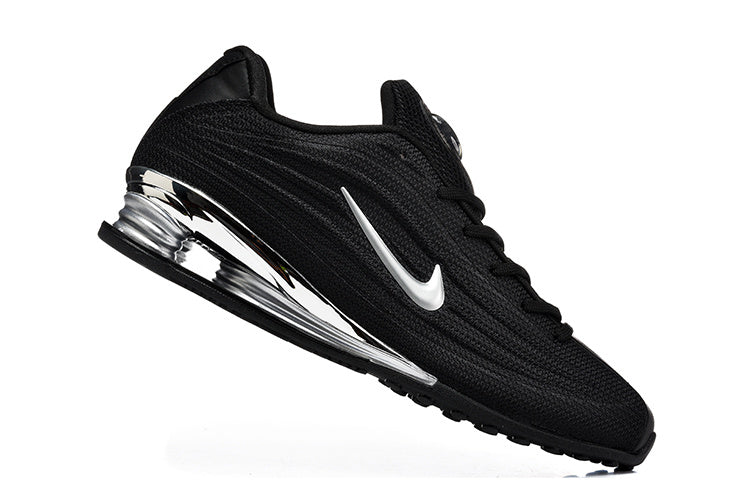 Nike Black and Silver Plated-Detail Trainers - product image from the listing.