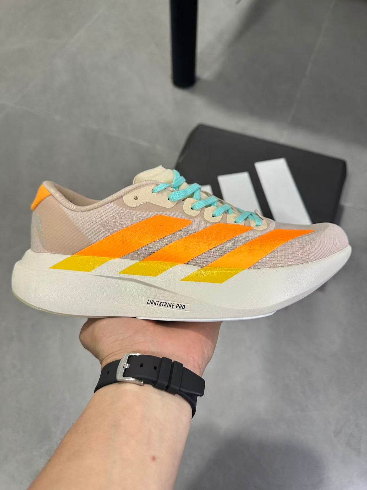 Adidas Lightstrike Pro Running Shoes, in Beige Orange - product image from the listing.