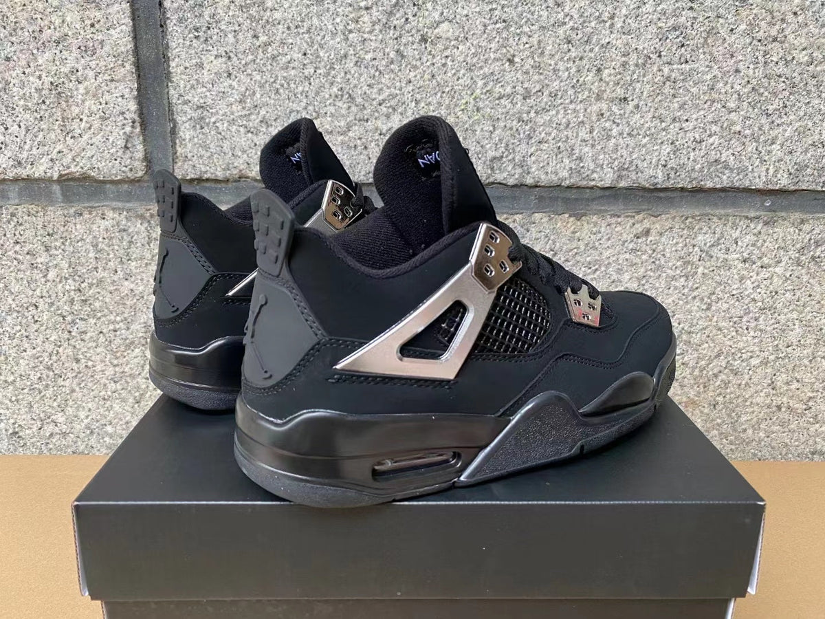 "Black Cat" Air Jordan 4 Sneakers - Chrome Silver - product image from the listing.