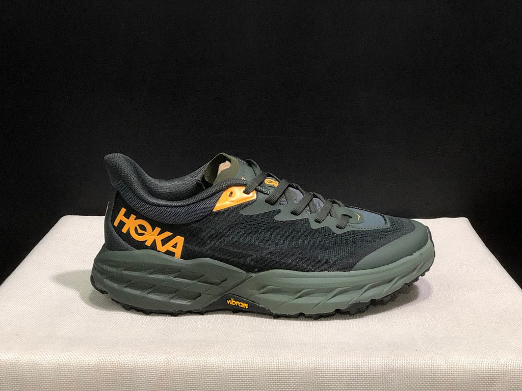 HOKA Speedgoat 5 Trail Running Shoes, in Black and Olive - product image from the listing.