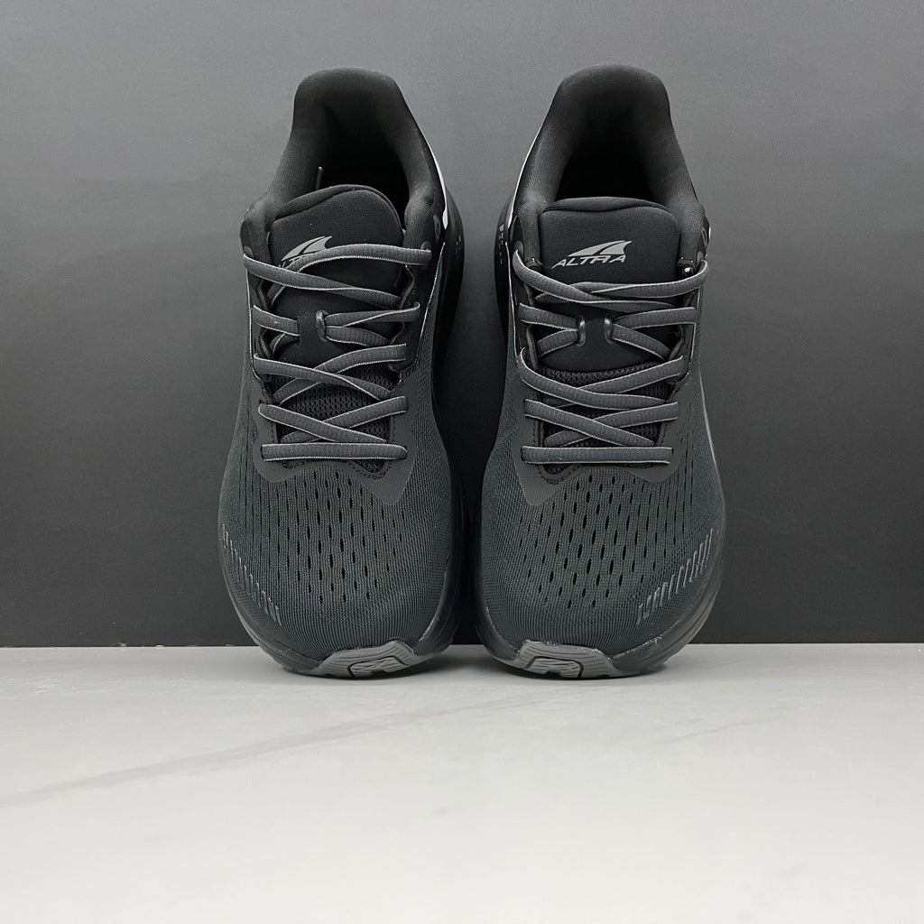 Altra Via Olympus Running Sneakers in Black - product image from the listing.